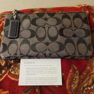 Coach Signature Patent wallet or wristlet in Black.